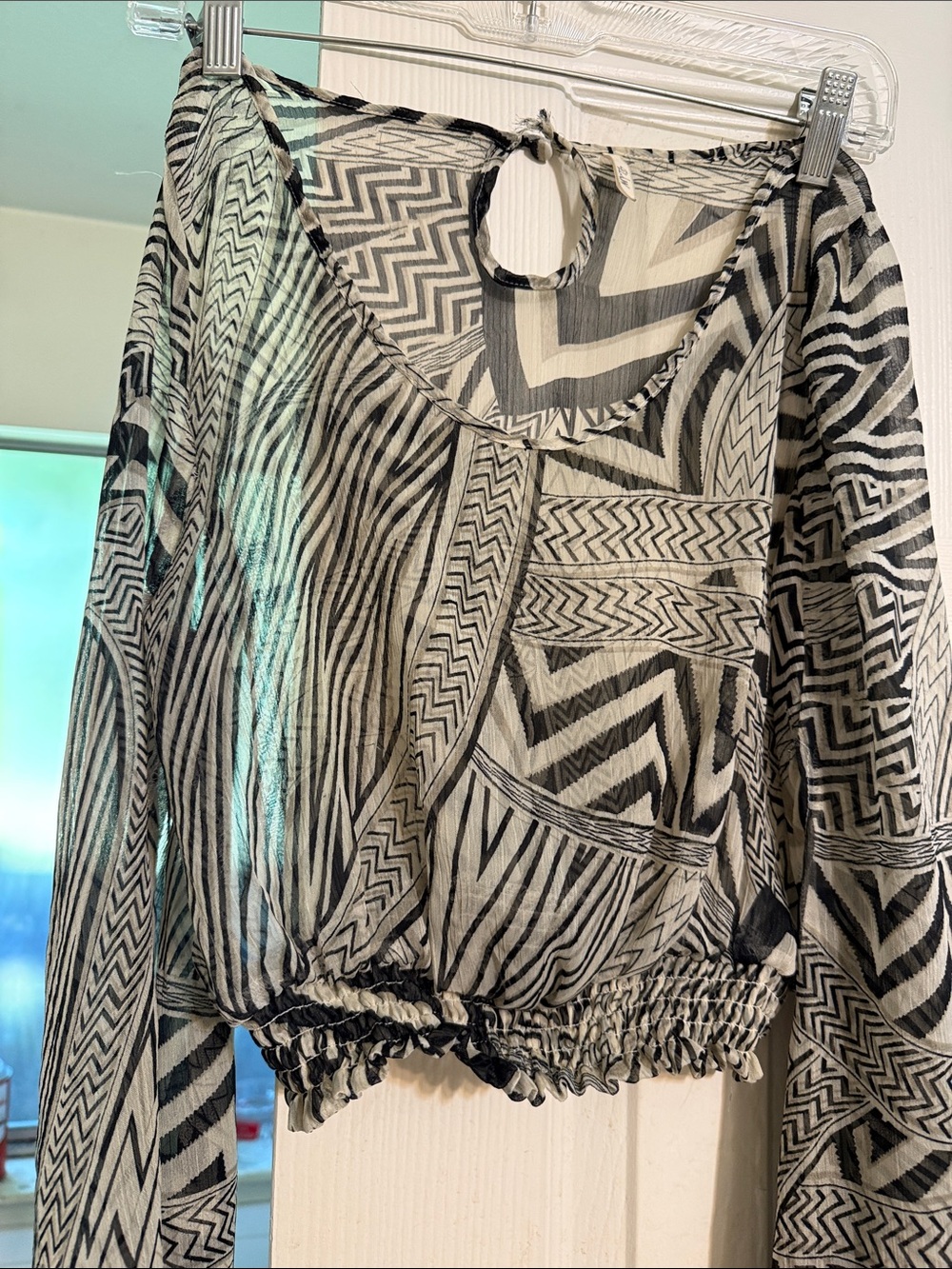 Sheer Black and Cream Printed Cropped Blouse with Elastic Hem and Keyhole